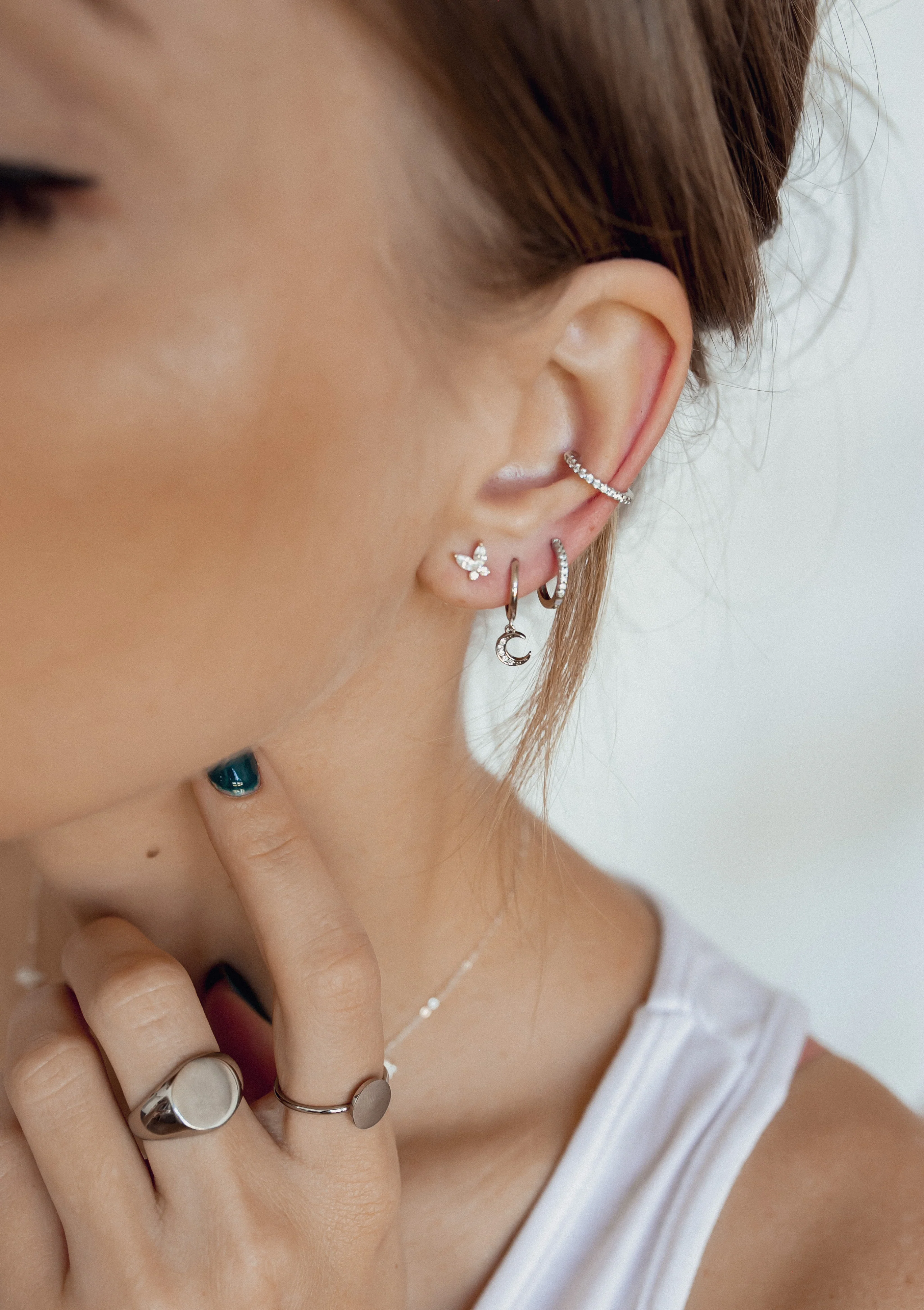 Crescent Moon Huggie Earrings Sterling Silver - Image 4